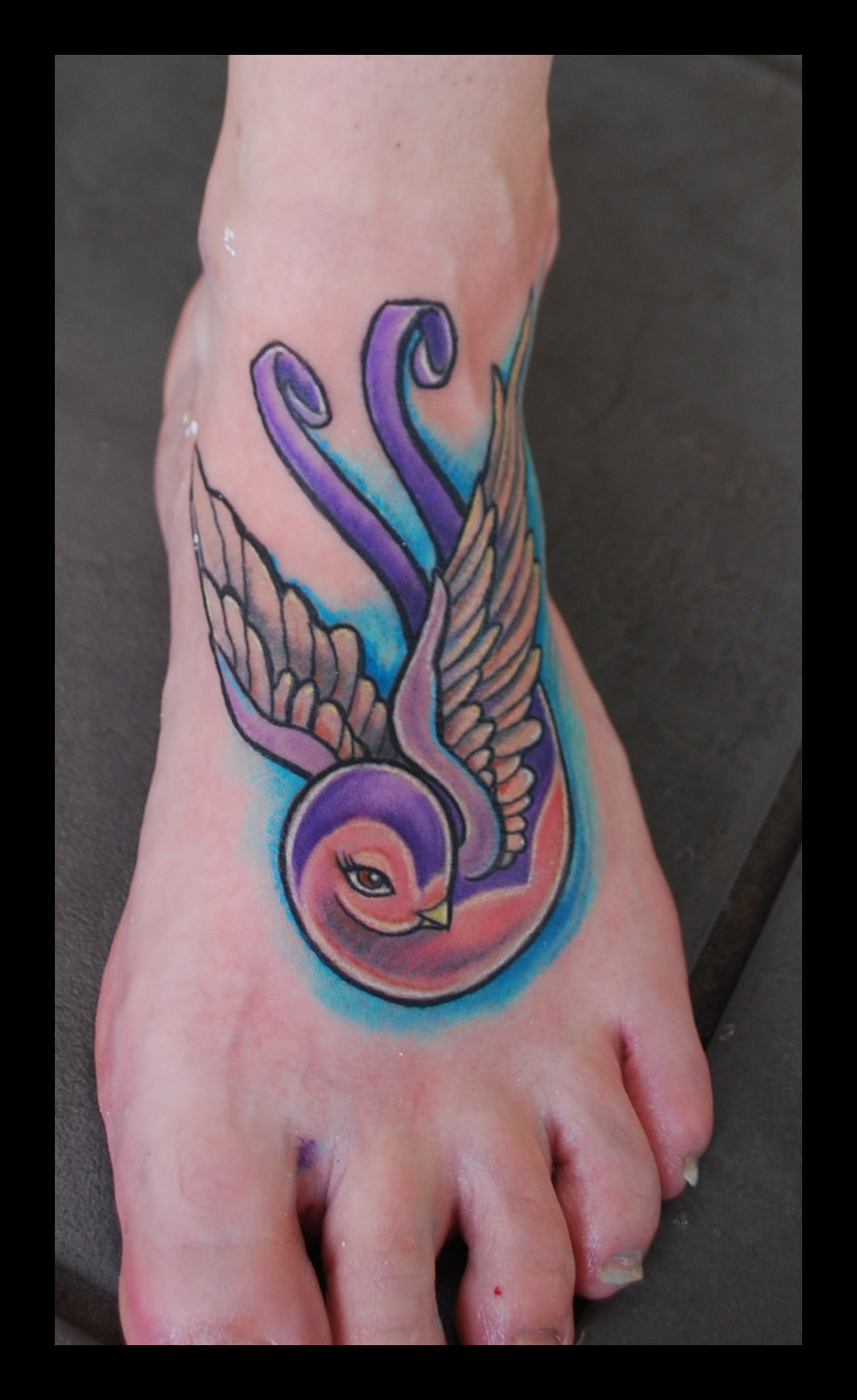 Cute swallow foot tattoo | Hannah Calavera Tattoos Bristol